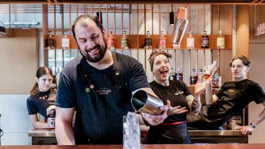 Lizzie and the staff at the Four Pillars Gin distillery in Healesville having fun and making gin cocktails.