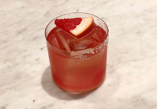 A colourful four pillars gin salty dog negroni gin cocktail.