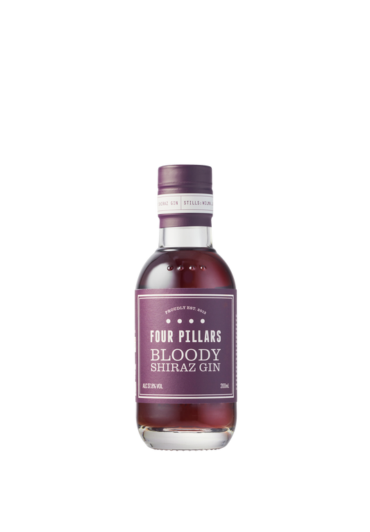 A mini bar bottle sized Four Pillars Gin Bloody Shiraz Gin