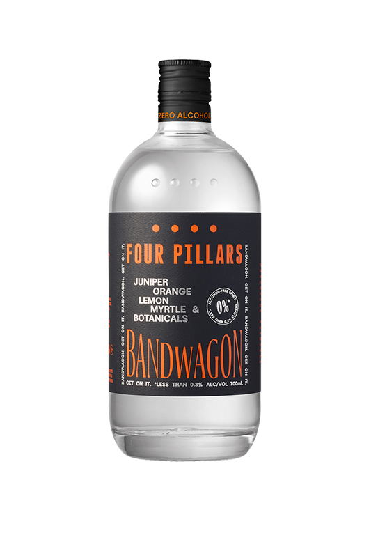 A bottle of Four Pillars Bandwagon gin featuring juniper, orange, lemon, myrtle, and botanicals. The label indicates it contains less than 0.3% alcohol and is 700ml in size.