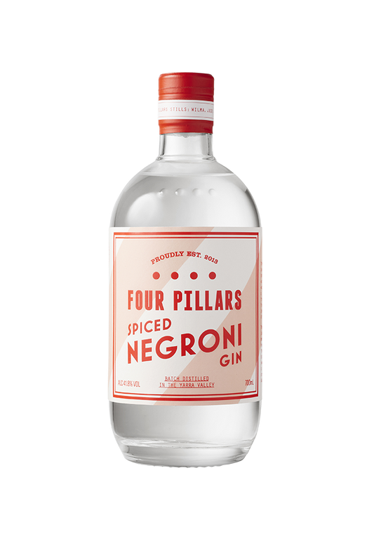 a deep etch of Four Pillars Gin's Spiced Negroni Gin bottle with its pink, red and white label.