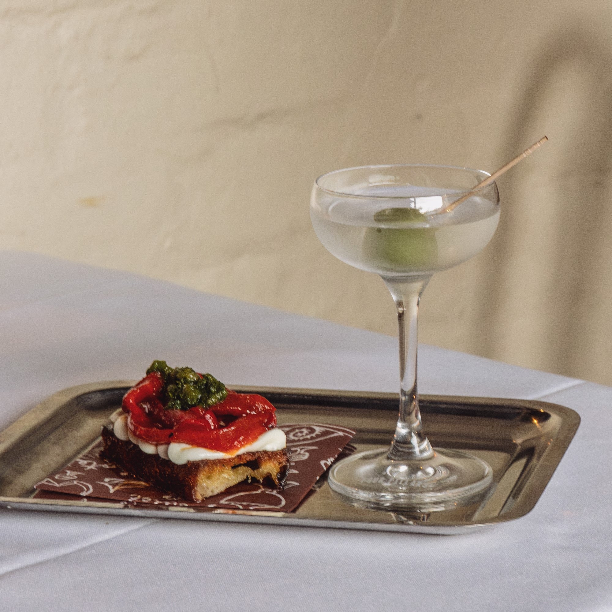 Le Foote Olive Leaf Gin mini Martini and a savoury snack, part of Four Pillars Martini Collective.