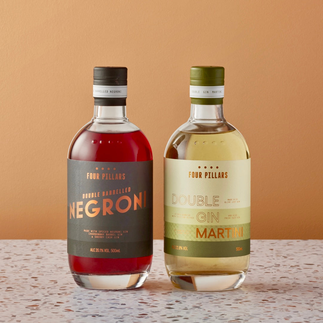 A Four Pillars Gin corporate gifting bundle consisting of two ready-to-drink bottled cocktails, Double Barrelled Negroni, and Double Gin Martini. 