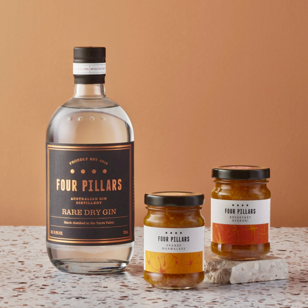 A Four Pillars Gin corporate gifting bundle of Rare Dry Gin and two made-from-gin marmalades, Breakfast Negroni and Orange flavour. 